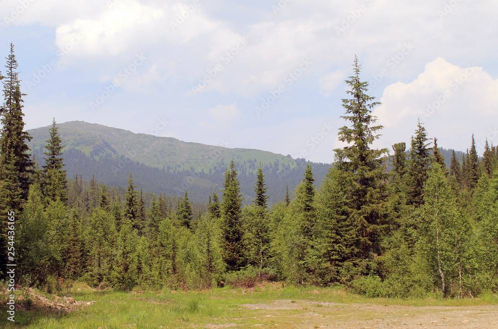 beautiful scenic clouds on mountain landscape Sayany