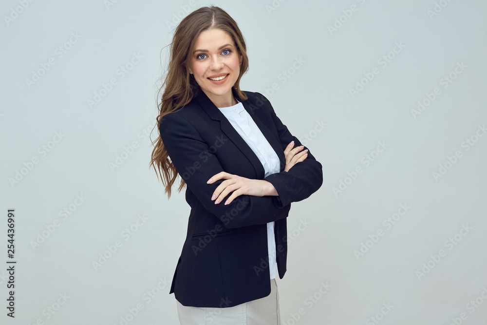 Smiling businesswoman with crossed arms in business suit. Smiling businesswoman with crossed arms in business suit.