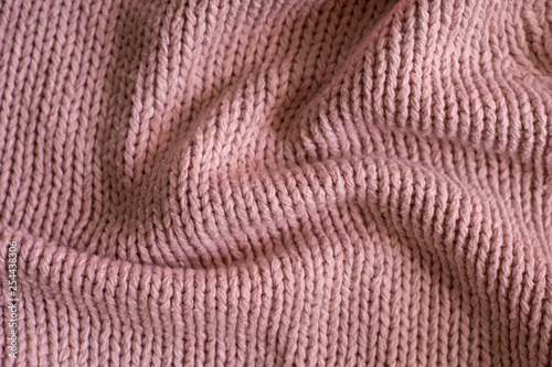 Beige knitting wool texture background