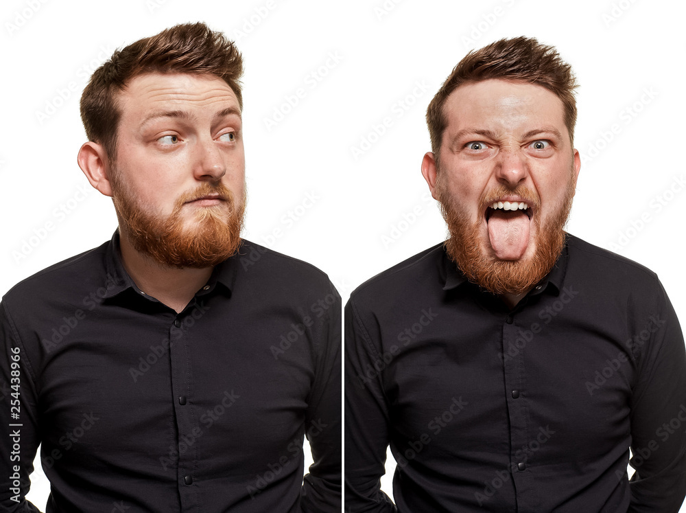 Brutal, attractive, bearded man poses in a black shirt, isolated on a white background Brutal, attractive, bearded man poses in a black shirt, isolated on a white background