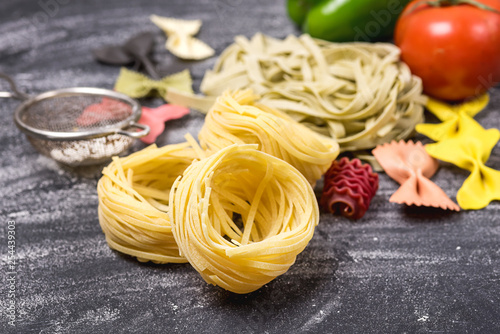 Raw Pasta Italian Traditional Food Tagliatelle and Farfalle Horizontal Vegetables