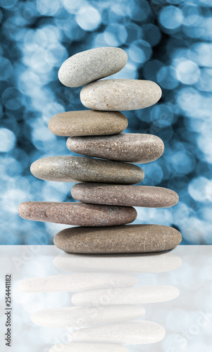  stones on a blurred blue background