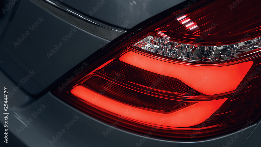 Detail on the rear light of a car. Car detail. Developed Car's rear brake light