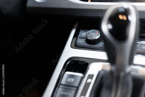 Air conditioning button inside a car. Climate control unit in the new car. Modern car interior details. Car detailing. Selective focus
