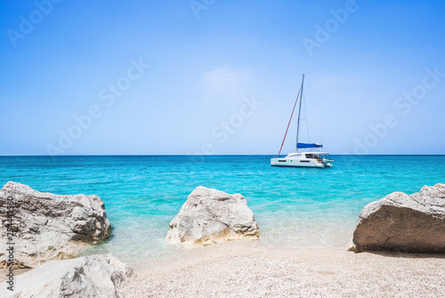 Beautiful bay with sailing boat and beach, Lefkada island, Greece