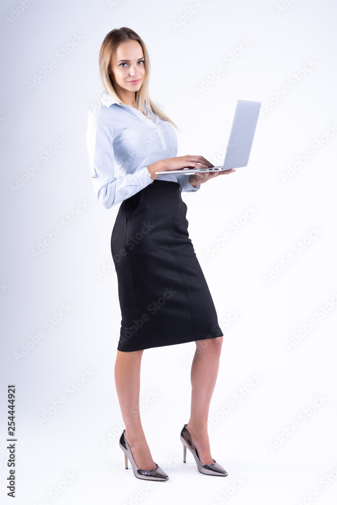 woman with laptop in hand on white background woman with laptop in hand on white background