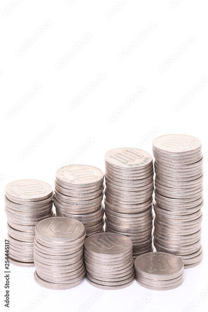 stacked Japanese 100 yen coins step up and step down graph stacked Japanese 100 yen coins step up and step down graph