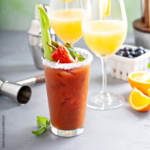 Brunch cocktails with orange mimosas and bloody mary © fahrwasser