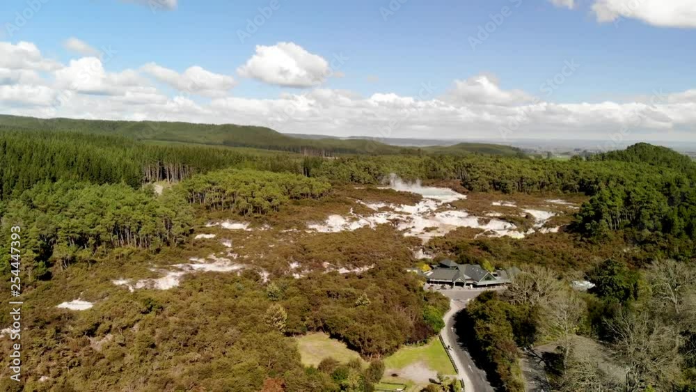 Wai O Tapu park in Rotorua, aerial view, going down from the sky Wai O Tapu park in Rotorua, aerial view, going down from the sky
