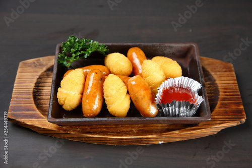 Stir-fryed potatoes and sausages