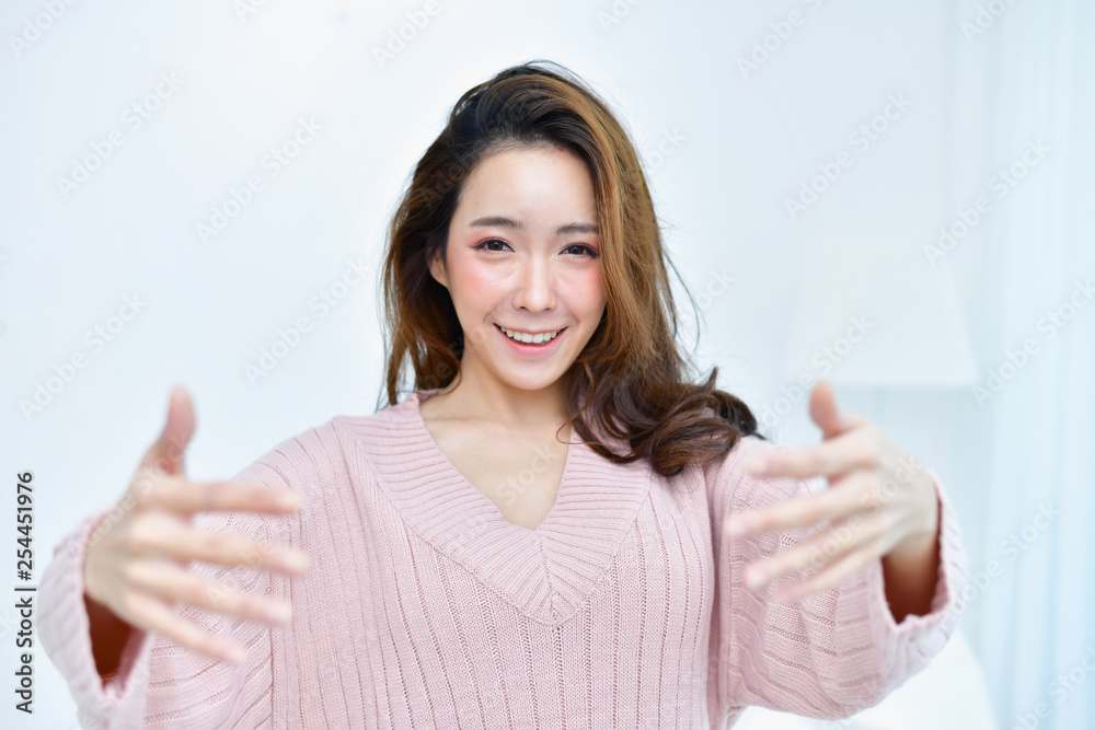 Winter Concept. Cute Asian girl in winter dress. Beautiful women in winter clothes are selfie in the bedroom. Winter Concept. Cute Asian girl in winter dress. Beautiful women in winter clothes are selfie in the bedroom.