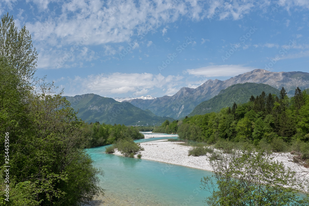 Turquoise river Isonzo flows in the valley