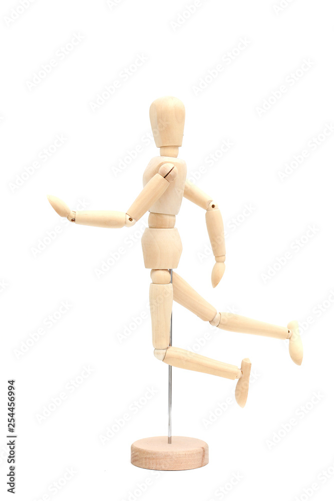 wooden doll in different poses. wooden figure concepts. figure isolated on white background wooden doll in different poses. wooden figure concepts. figure isolated on white background
