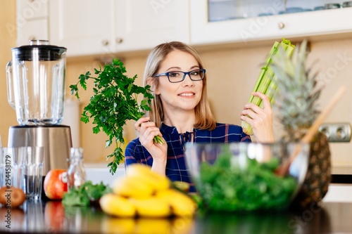 Woman dietetic in kitchen.