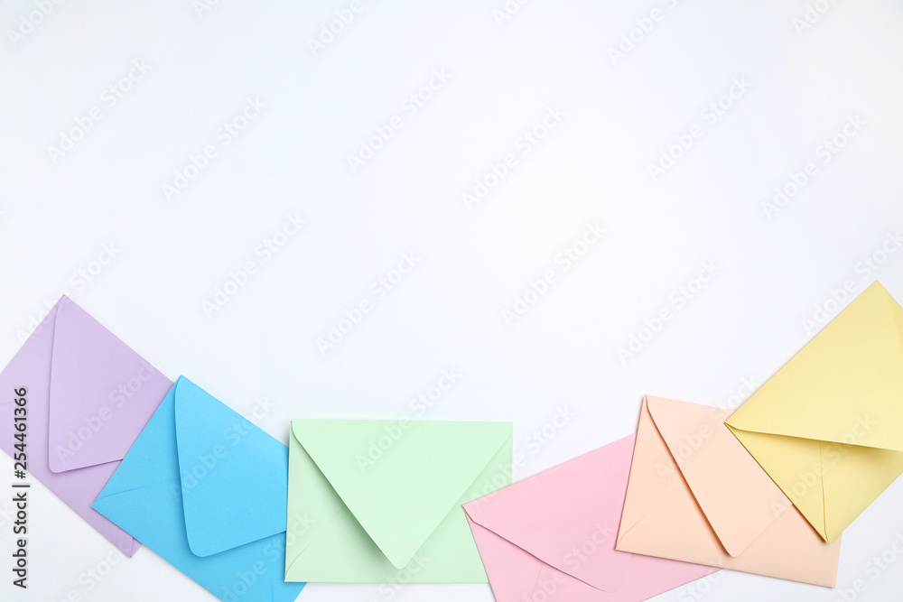 Colorful paper envelopes on white background Colorful paper envelopes on white background