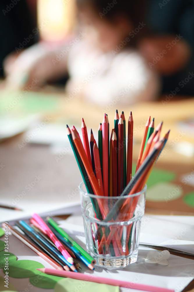 colorful pencils in glass colorful pencils in glass