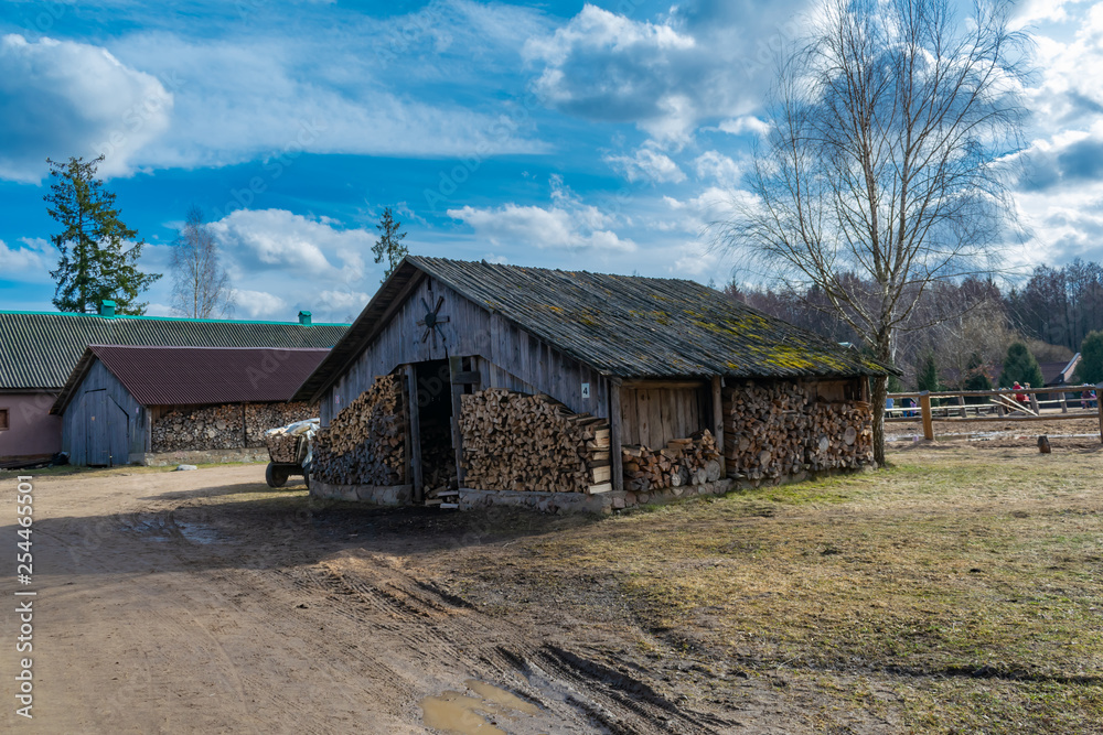 old Russian palennitsa for storing firewood for the winter old Russian palennitsa for storing firewood for the winter