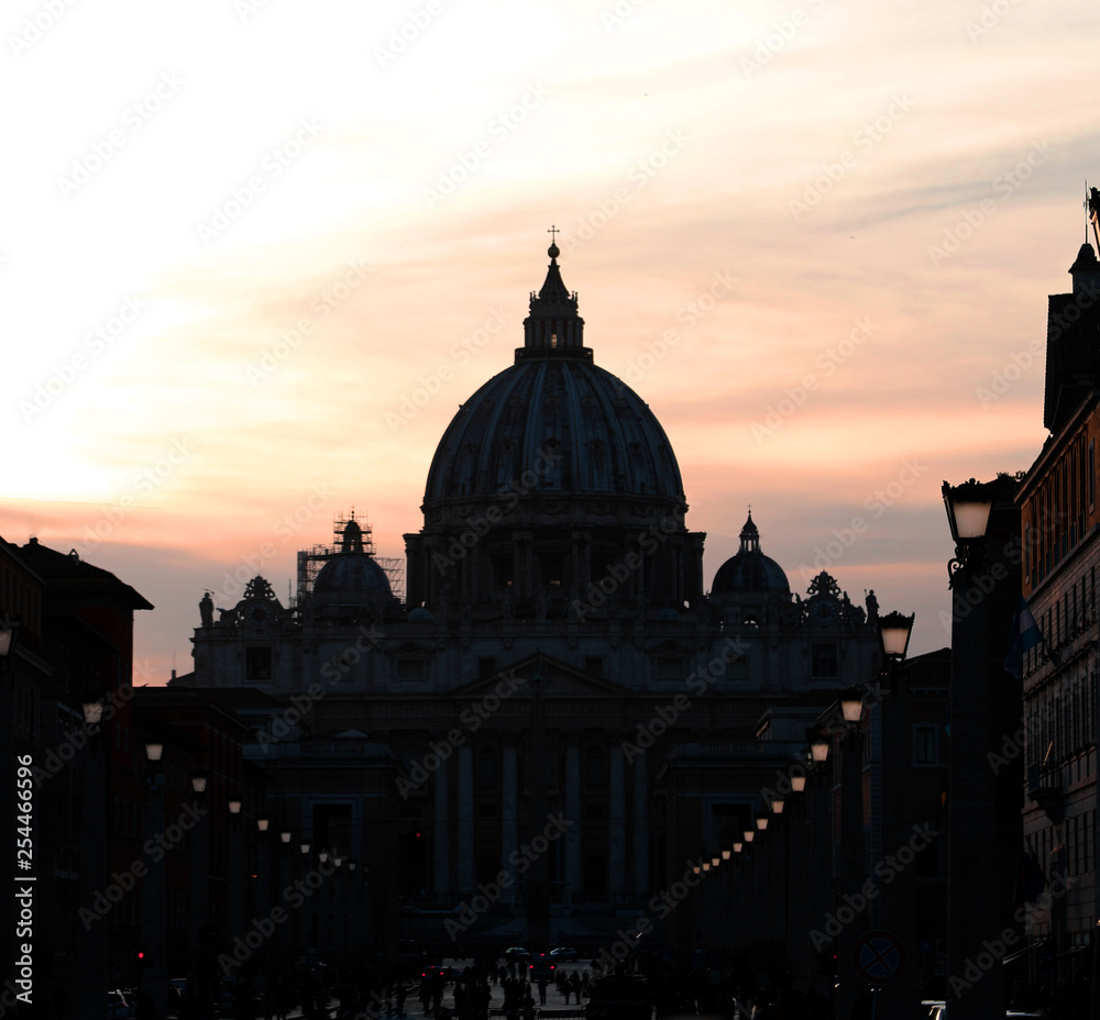 black silhouette of the great dome of Saint Peter Basilica in th