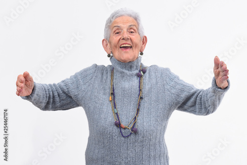 enior woman hugging on white background photo