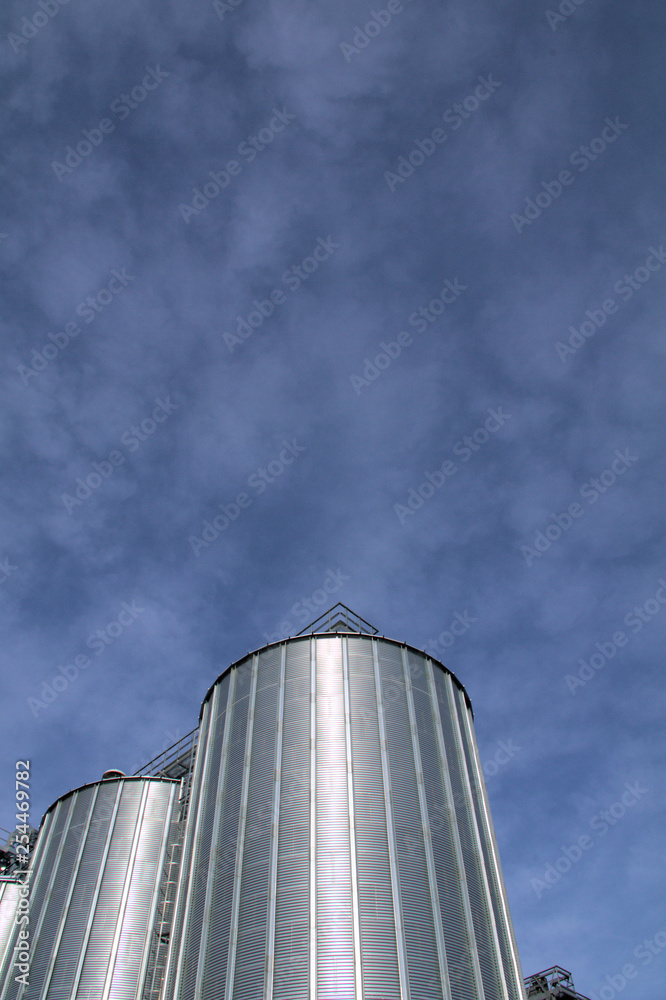 silo and blue sky,storage,metal,steel,agriculture,construction, plant, structure, tower, silo and blue sky,storage,metal,steel,agriculture,construction, plant, structure, tower,