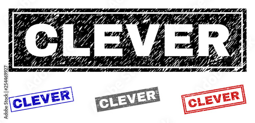 Grunge CLEVER rectangle stamp seals isolated on a white background. Rectangular seals with distress texture in red, blue, black and grey colors.