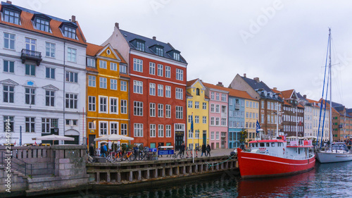 The colorful row of buildings along the waterfront at the Nyhavn district in Copenhagen
