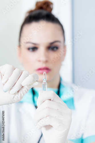 young doctor with syringe