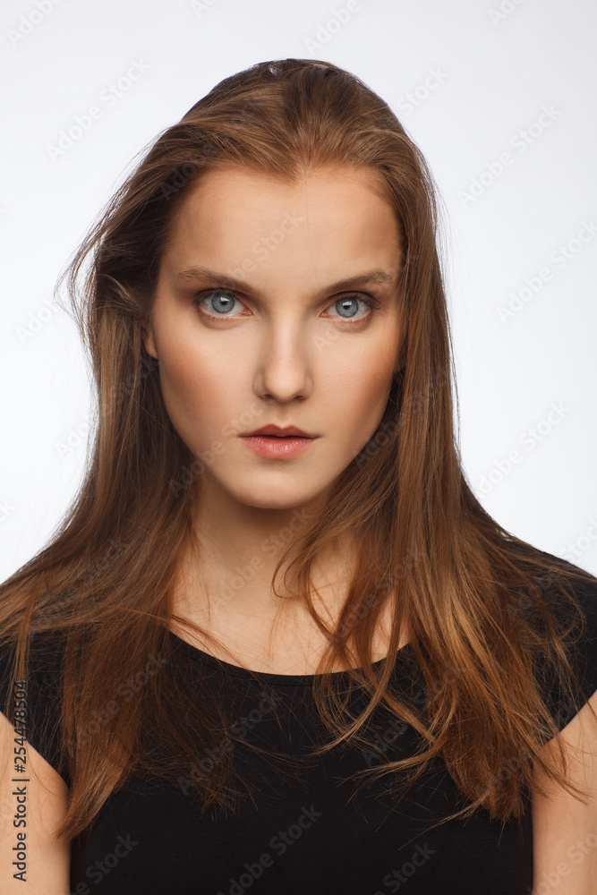 Portrait of a beautiful model with strong emotion, dressed in a black dress Portrait of a beautiful model with strong emotion, dressed in a black dress