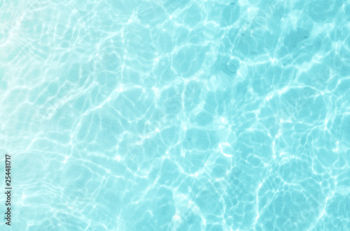 Blue swimming pool. Summer background. Summer vacation.