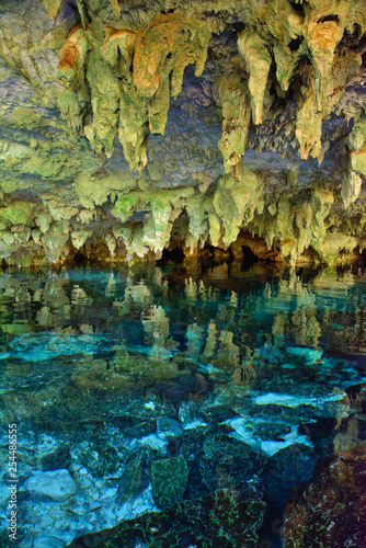 Dos Ojos cenote. Cenote with transparent waters, with the possibility of diving in a cave with a cylinder or snorkel (scuba diving or snorkeling). Without people, nobody. Tulum, Quintana Roo, Mexico