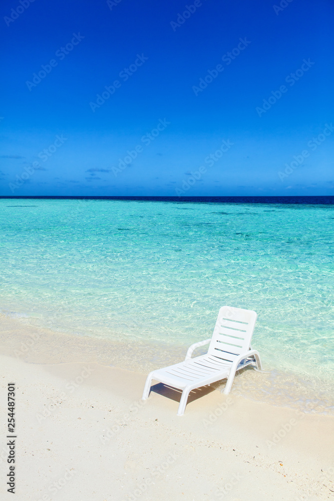 beach chair on tropical beach