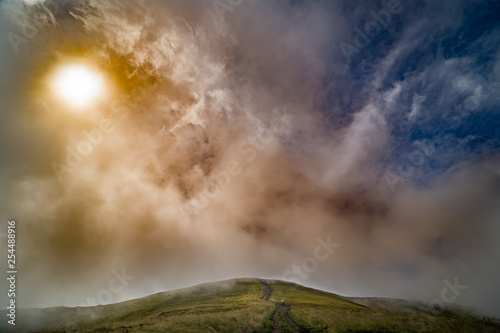 Landscape of Borzhava ridge of the Ukrainian Carpathian Mountains. Clouds above Carpathians