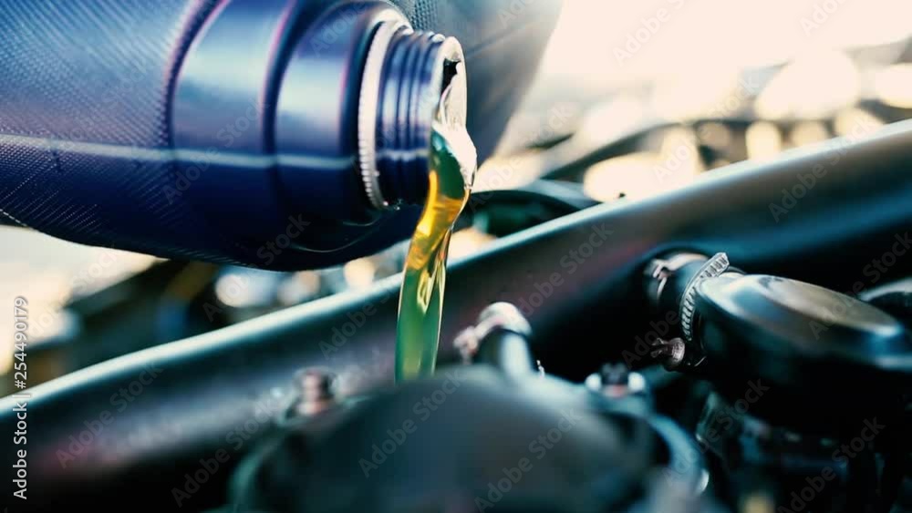 Replacing the engine oil in the car.