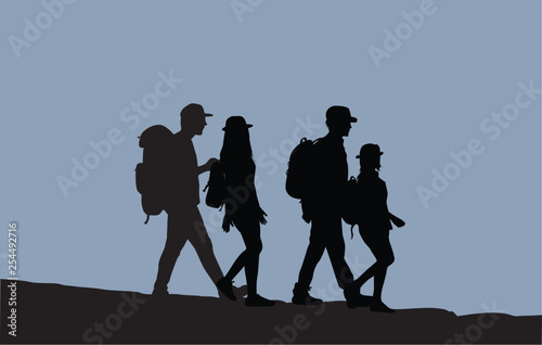 Silhouettes of people walking.