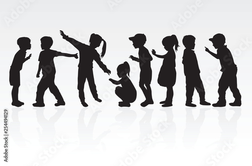 Vector silhouette of children on white background.