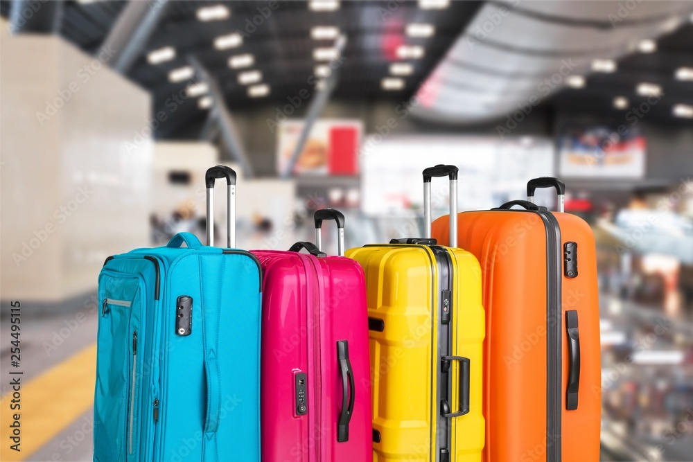 Luggage bags on background, travel concept Luggage bags on background, travel concept