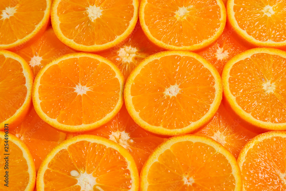 Slices of oranges as a background, top view. Slices of oranges as a background, top view.