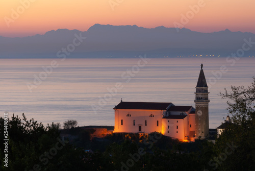 Piran in Slovenia with a beautiful red sunset © Paul Crispin