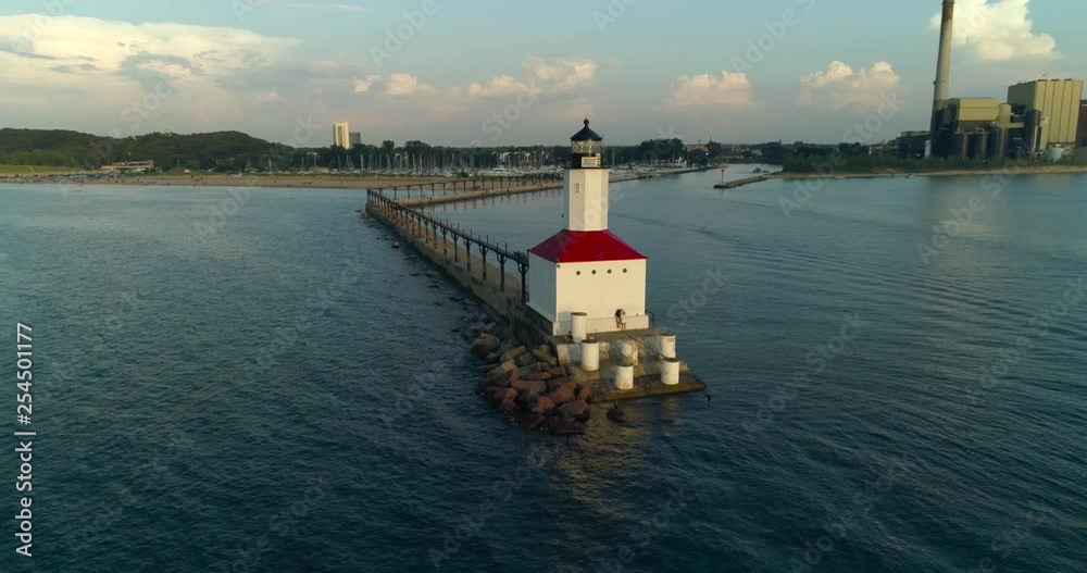 Lighthouse and Pier Sunset Aerial Video Golden Hour on Lake Michigan Lighthouse and Pier Sunset Aerial Video Golden Hour on Lake Michigan