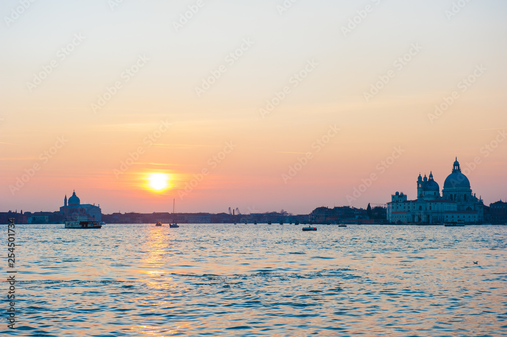 Amazing sunset in Venice with view on cathedral Santa Maria della Salute.