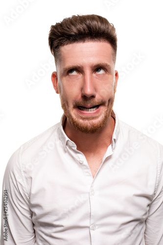 Studio photo of a good-looking man in a white shirt, isolated over a white background