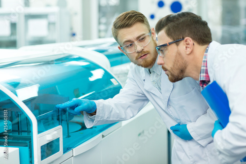 Two male scientists working at the laboratory