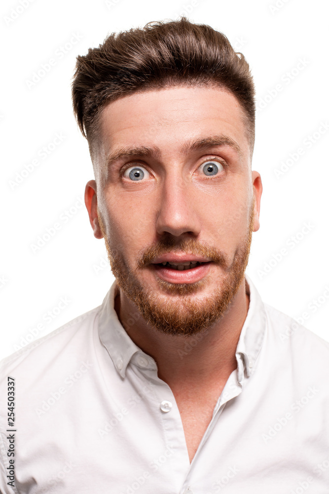 Studio photo of a good-looking man in a white shirt, isolated over a white background Studio photo of a good-looking man in a white shirt, isolated over a white background