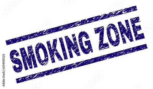 SMOKING ZONE seal imprint with scratced style. Blue vector rubber print of SMOKING ZONE text with retro texture. Text caption is placed between parallel lines.