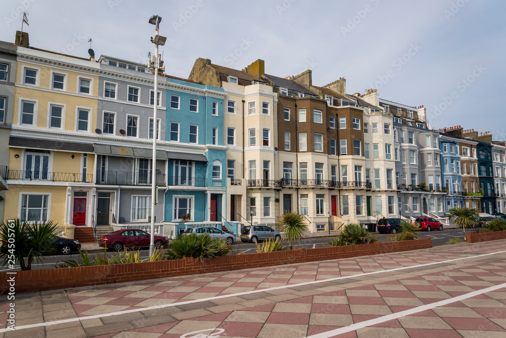 Seafront promenade and and row of posh townhouses, St Leonards-on-Sea, Hastings, East Sussex, England, UK