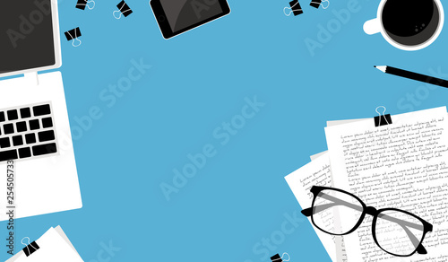 Workplace for business, management and IT. View from above. Laptop, mobile phone, notebook and office supplies on the desktop