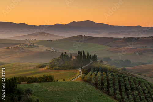 tuscany landscape in summer at sunrise