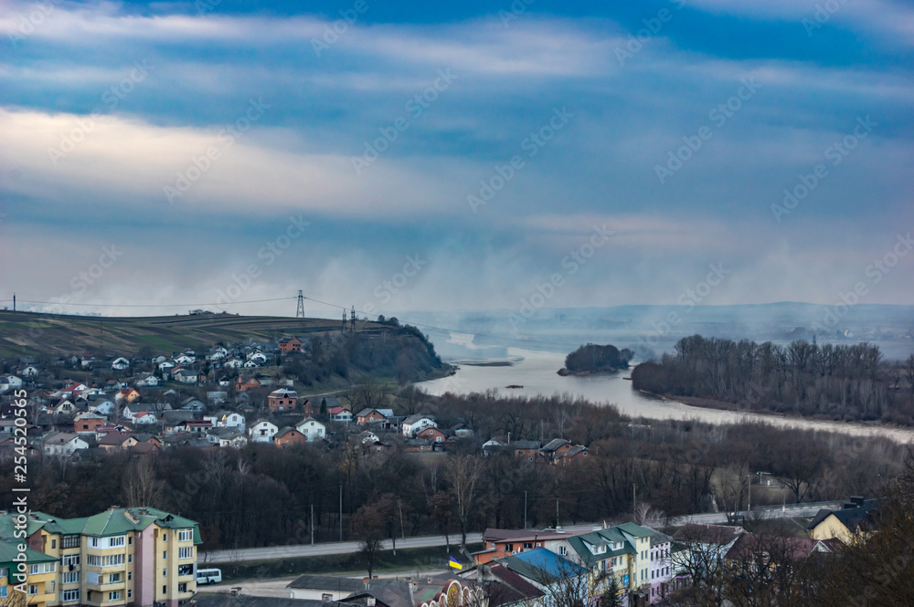 Obraz premium Panorama of a small European town at sunset