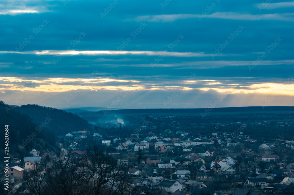 Panorama of a small European town at sunset