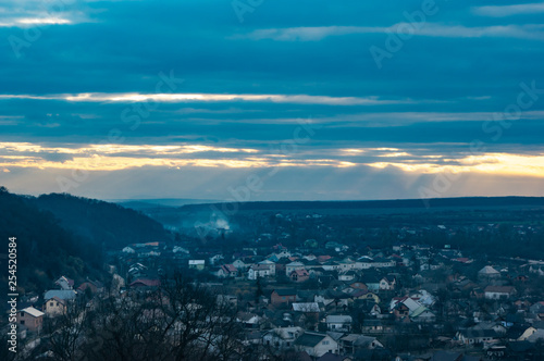 Panorama of a small European town at sunset © onyx124
